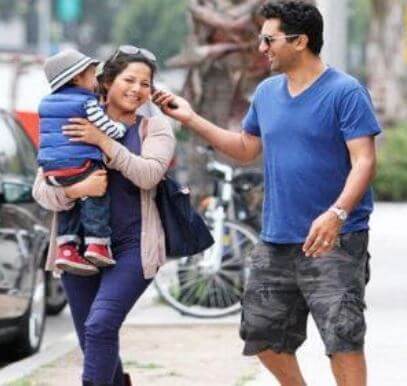 Cliff Curtis with his wife and kid.